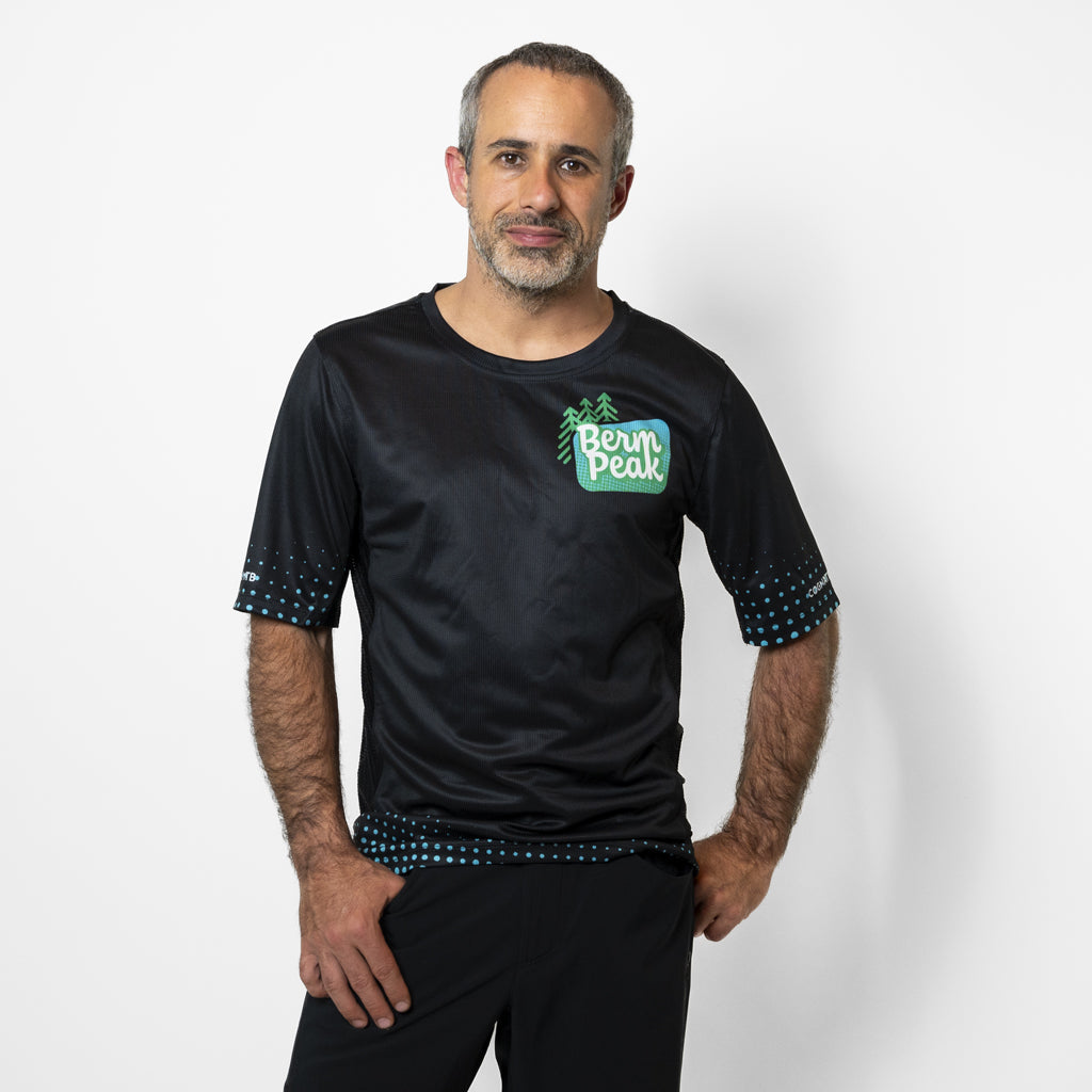 Seth Alvo wearing the Men's Berm Peak Gravity MTB jersey