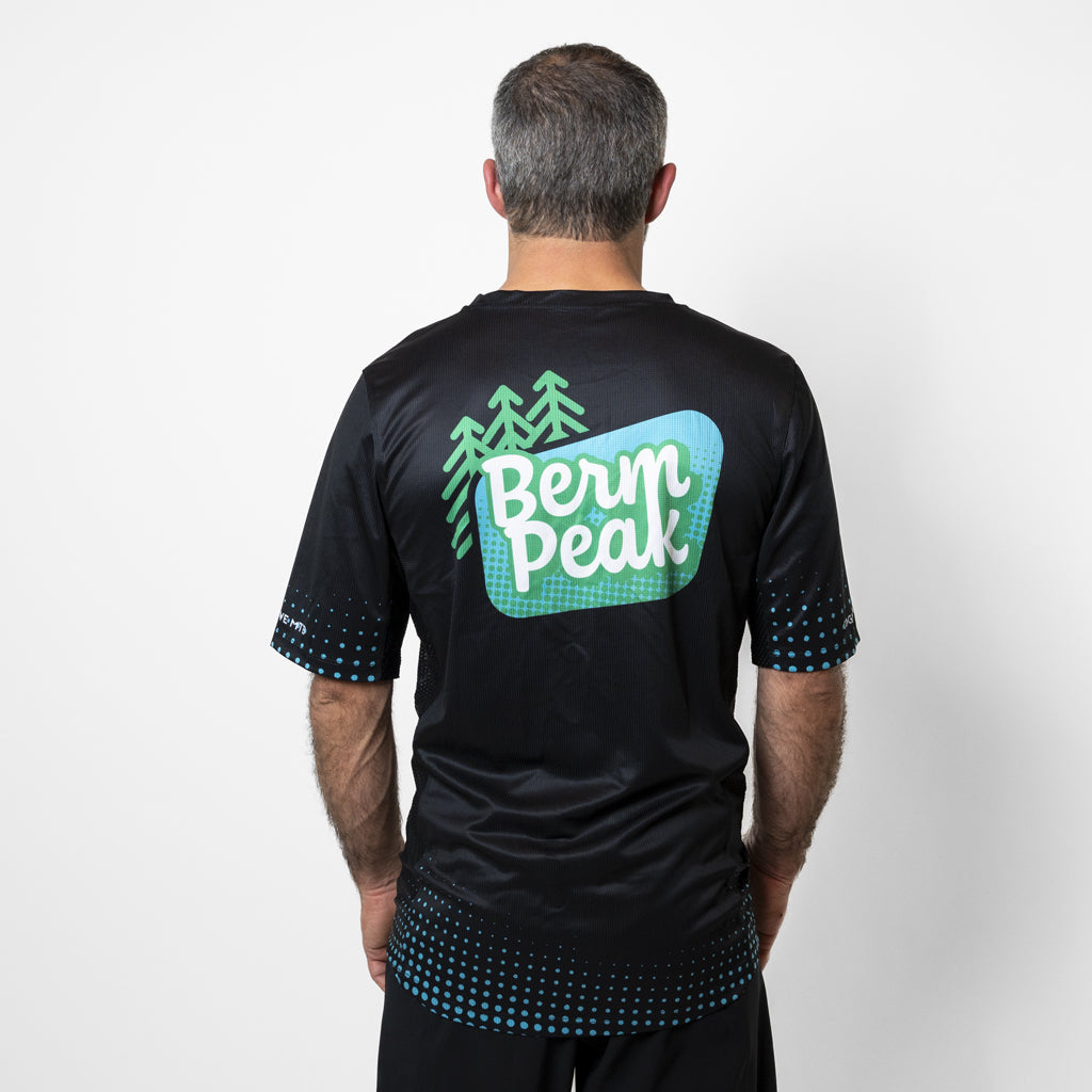 Back of the Men's Berm Peak Gravity MTB jersey, worn by Seth Alvo of Berm Peak