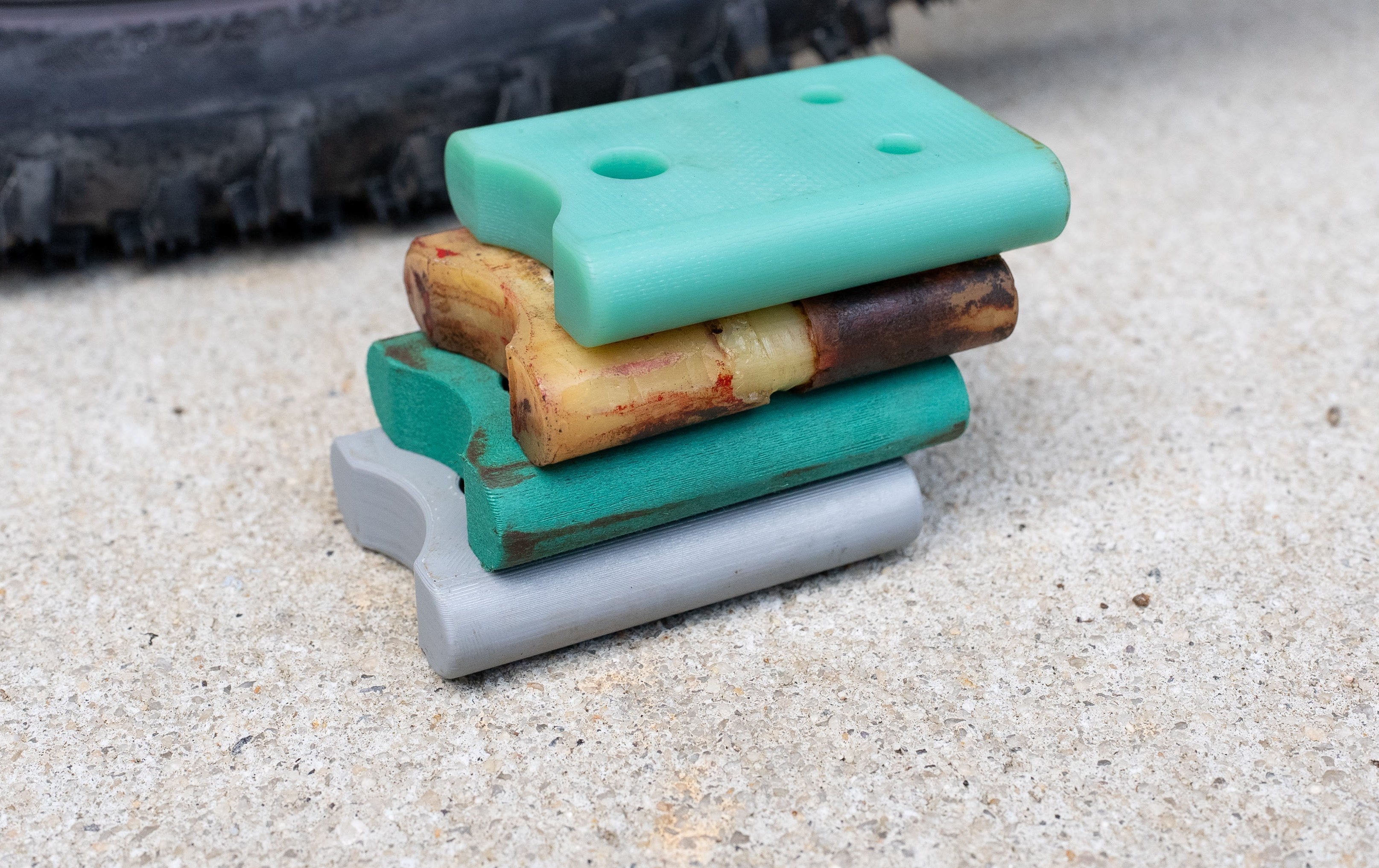 Spare and souvenir dog bone flex links, included