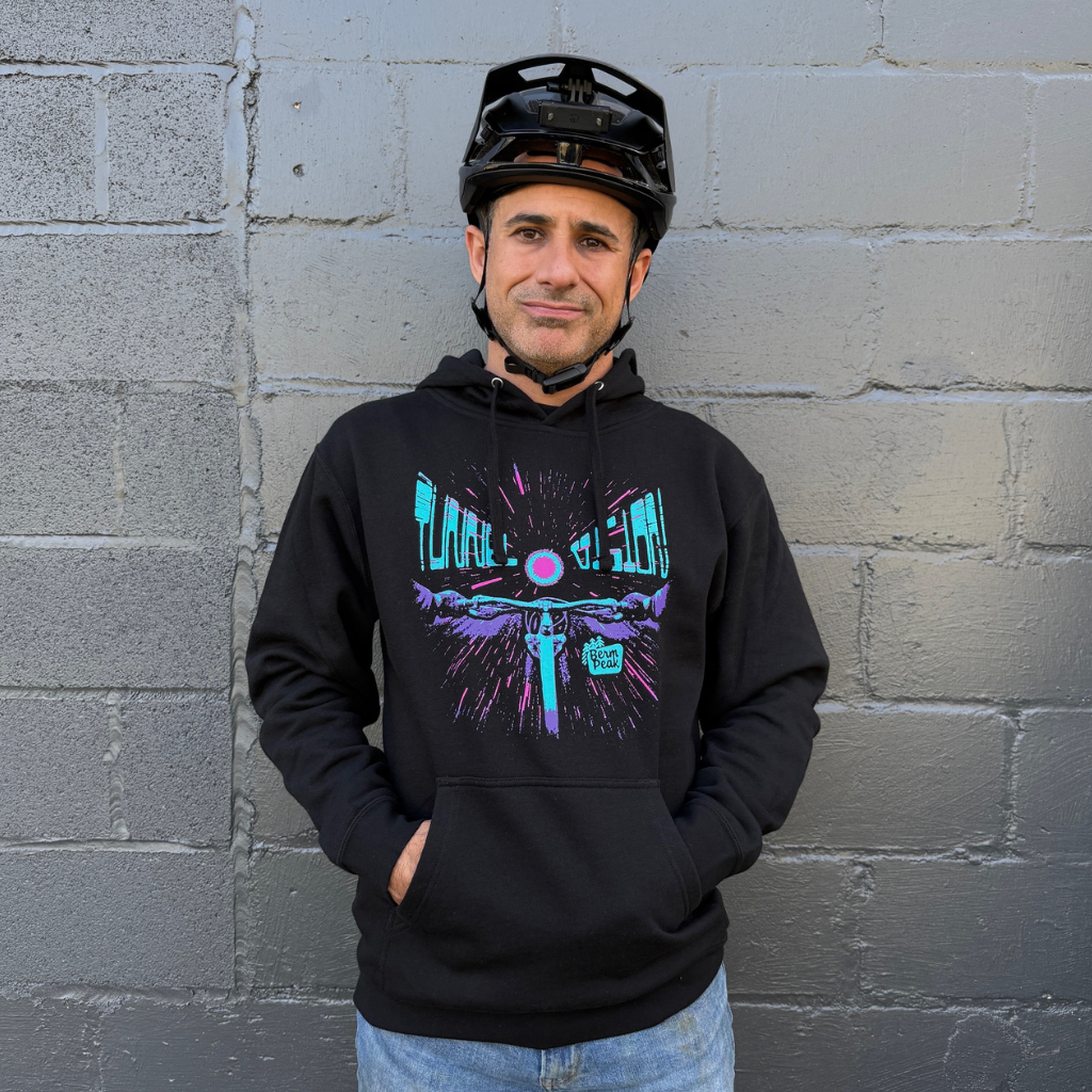 Seth Alvo of Berm Peak wearing the Berm Peak Tunnel Vision hoodie