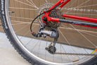 Rear derailleur and cassette